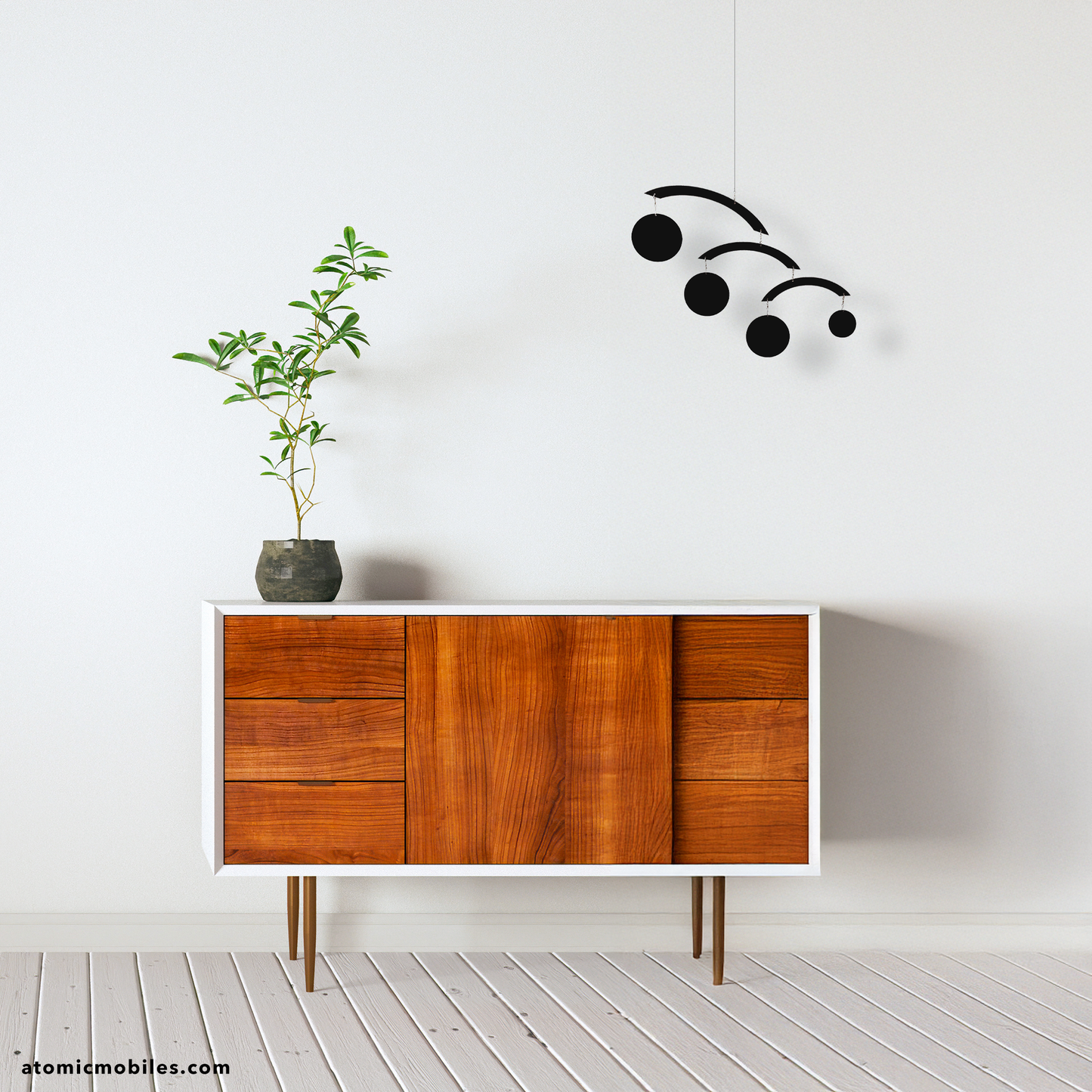 Simplicity, zen, credenza with plant and black mid century modern hanging art mobile - The Modernist Mobile - by AtomicMobiles.com