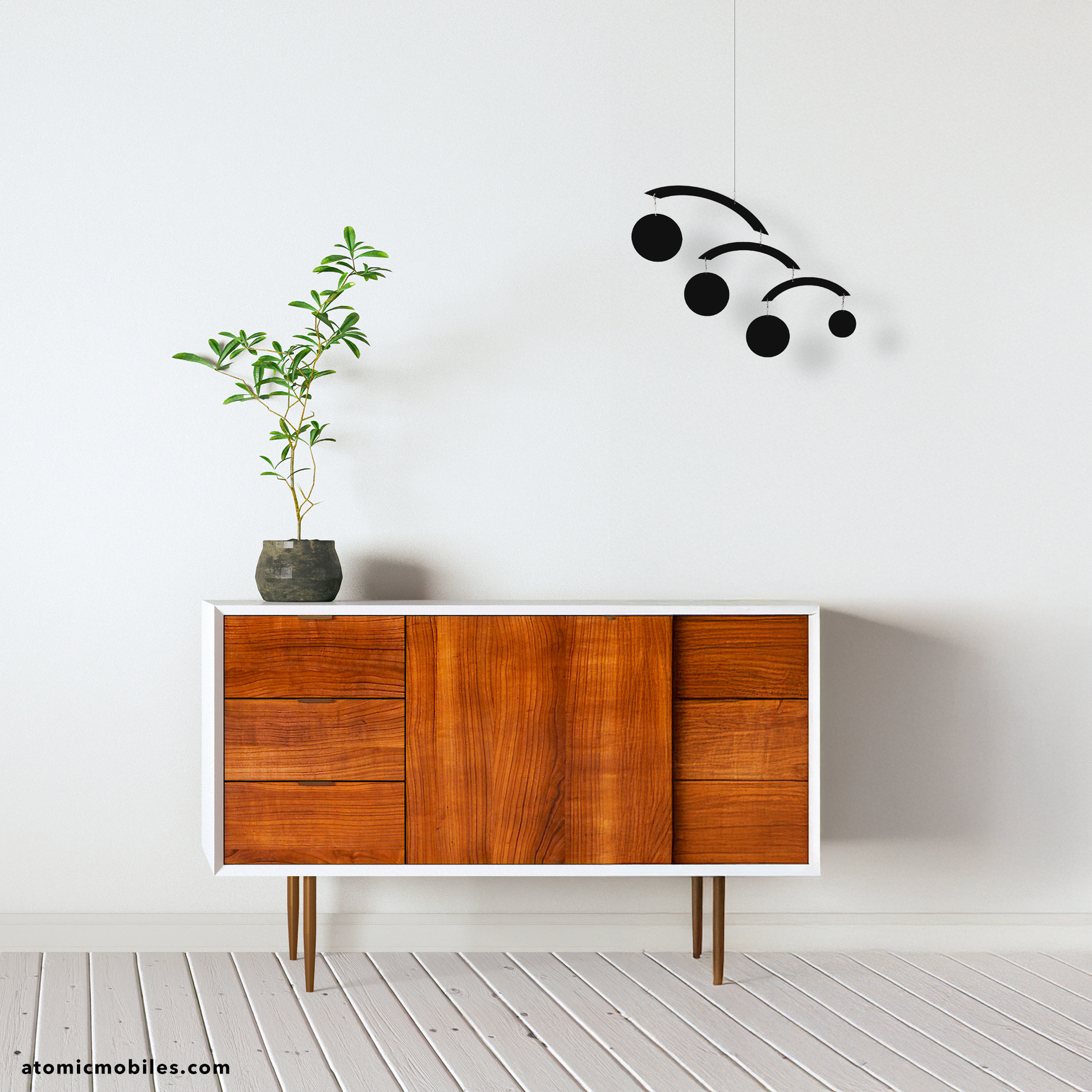 Simplicity, zen, credenza with plant and black mid century modern hanging art mobile - The Modernist Mobile - by AtomicMobiles.com
