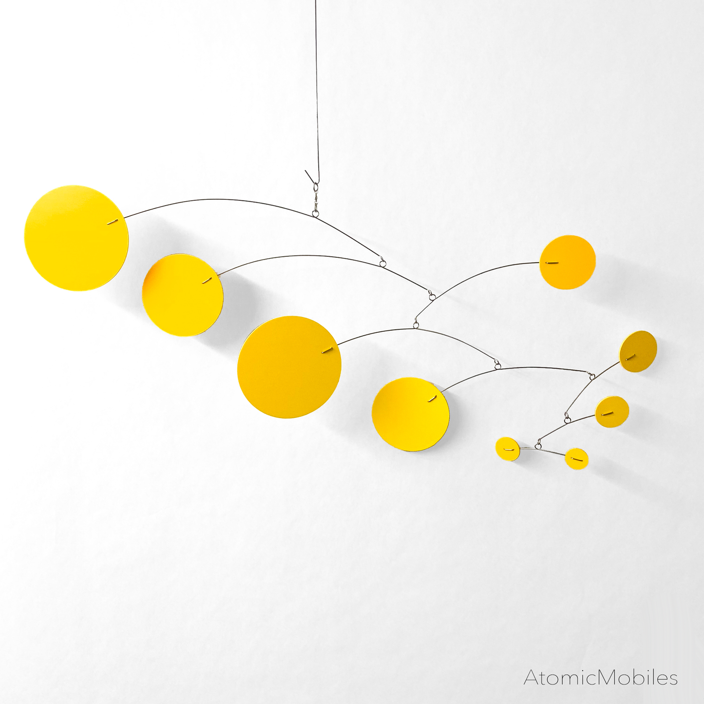 Beautiful Sunshine Yellow MOD hanging art mobile inspired by 1970s retro groovy style by AtomicMobiles.com - 28"w x 12"h in opaque yellow