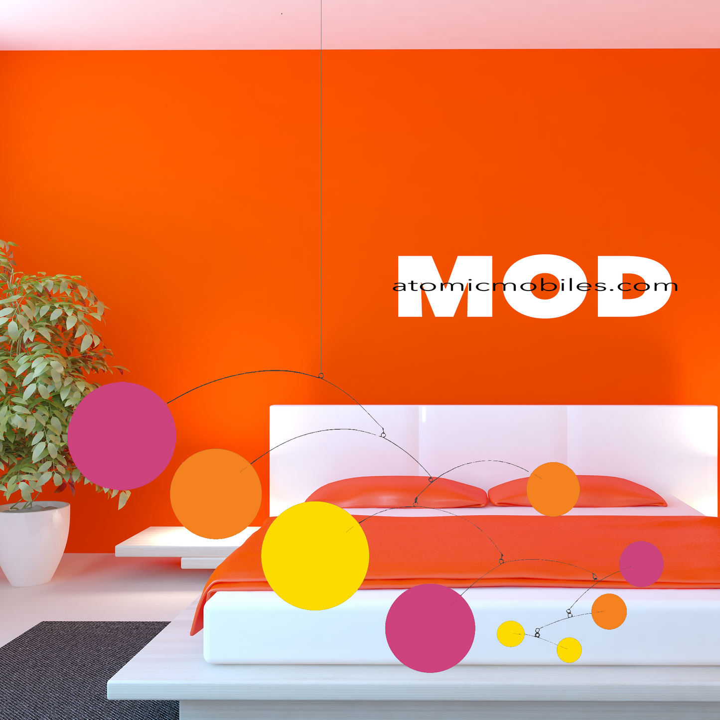 Groovy MOD Mobile in custom colors of Hot Pink, Tangerine Orange, and Yellow in bright orange bedroom with plant and white bed with orange bed sheets - hanging art mobiles in retro style by AtomicMobiles.com