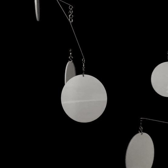 Animated gif of The Atomic Mobile in Opaque White Acrylic - hanging art mobiles by AtomicMobiles.com