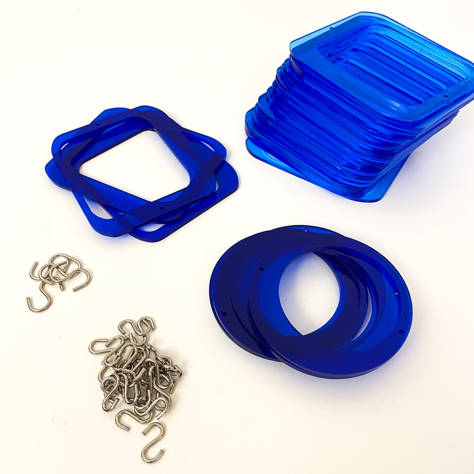 Parts for cool retro kinetic art piece DIY Kit in blue and navy blue for wall art, mobiles, or room dividers by AtomicMobiles.com