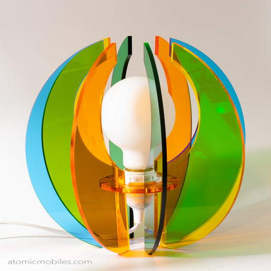 Gorgeous retro mid century modern style acrylic plexiglass table top lamp in clear orange, green, yellow, and blue by AtomicMobiles.com