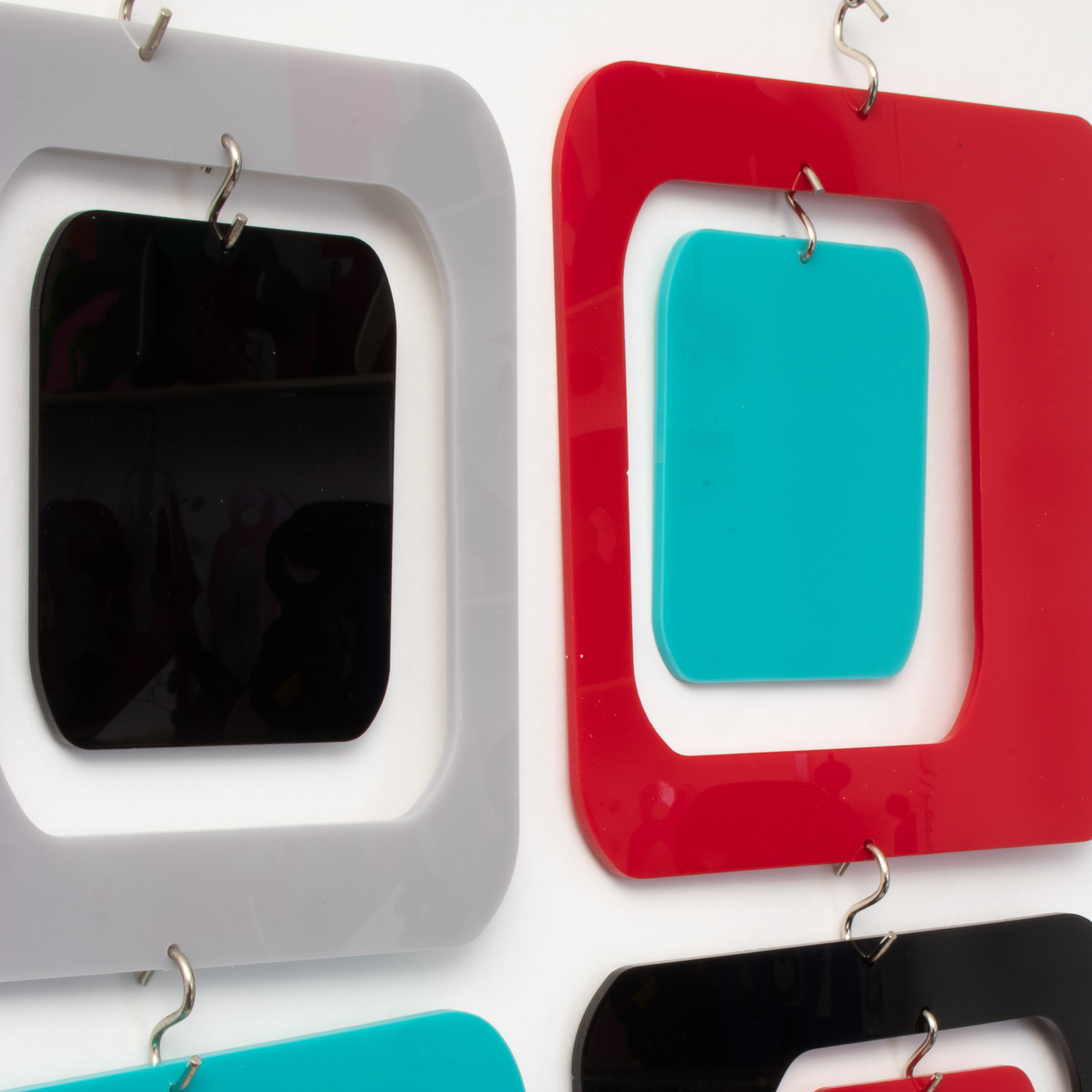 Closeup of Coolsville Room Divider Screen in Gray, Black, Red and Aqua by AtomicMobiles.com