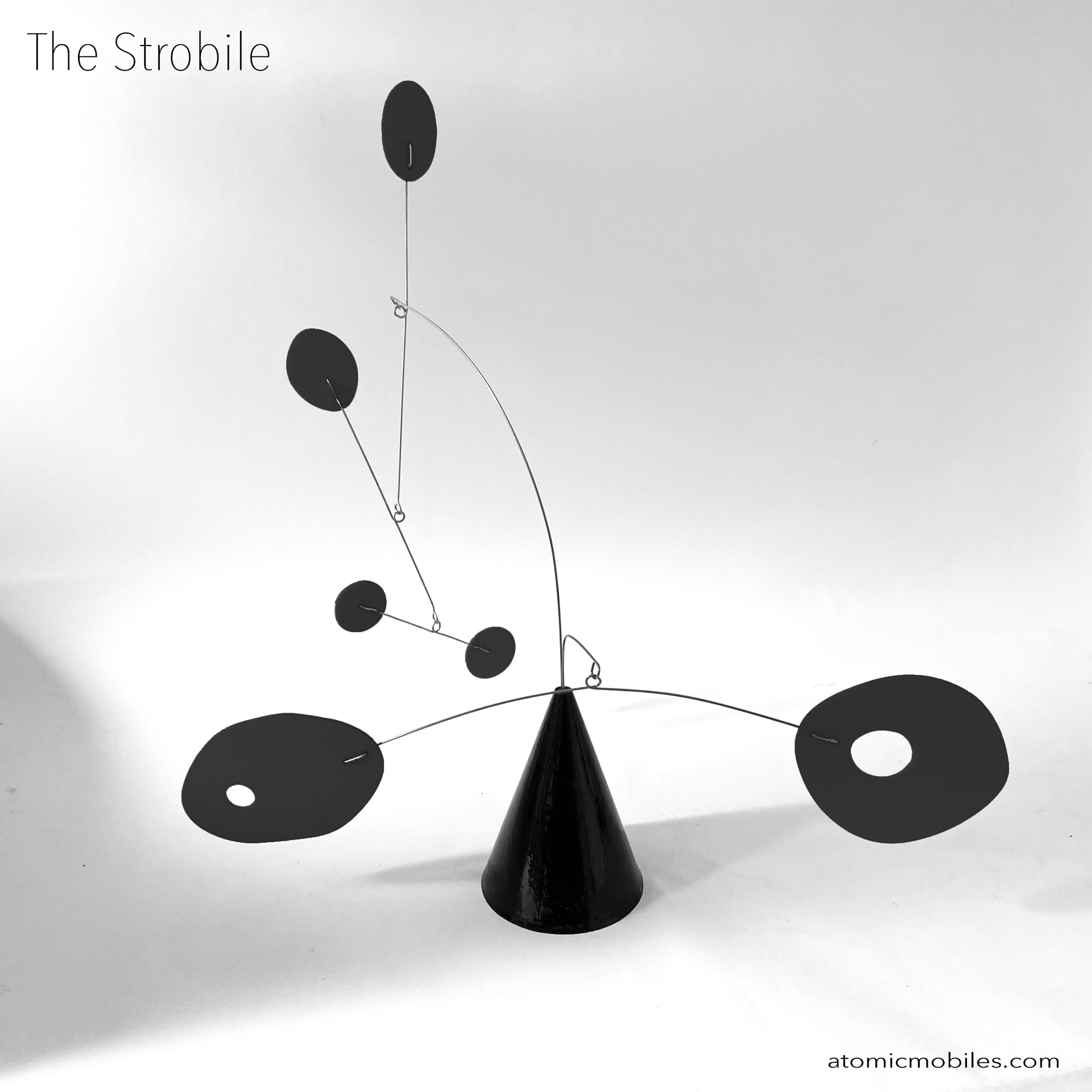 The Strobile table top kinetic art sculpture in all Black by AtomicMobiles.com