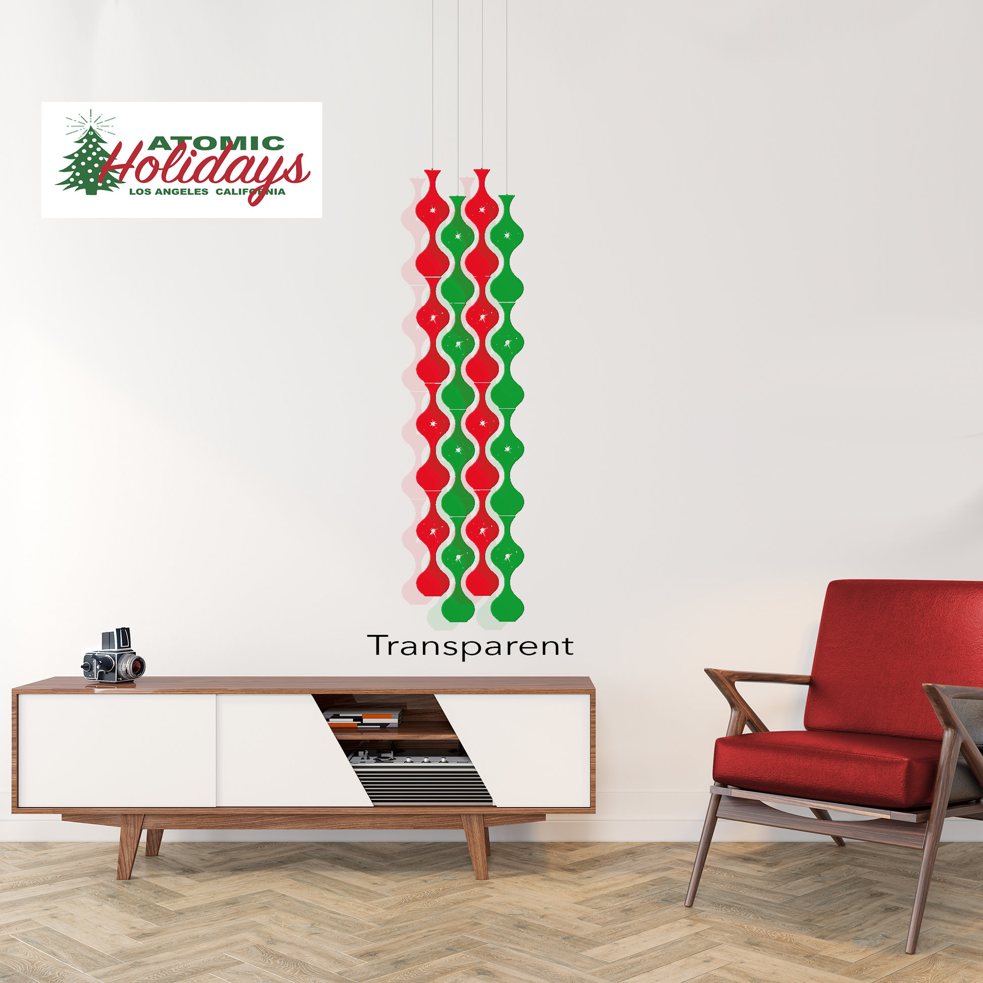 Jeannie Stardust Christmas Mobiles in transparent red and green acrylic - Mid Century modern Holiday decorations with MCM chair, credenza and camera - by AtomicMobiles.com