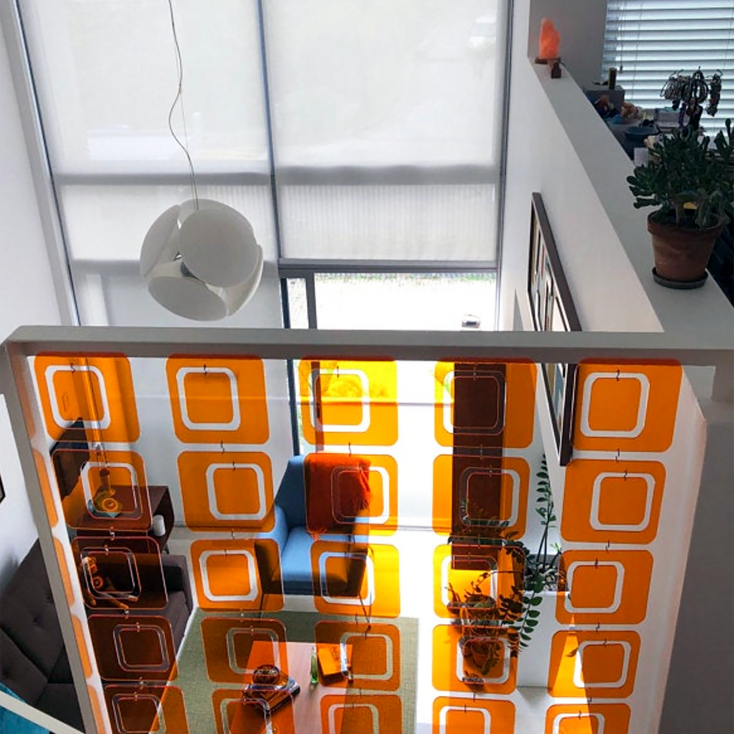 Clear Orange Coolsville Room Divider Kit installed in Mid Century Modern Living Room by AtomicMobiles.com