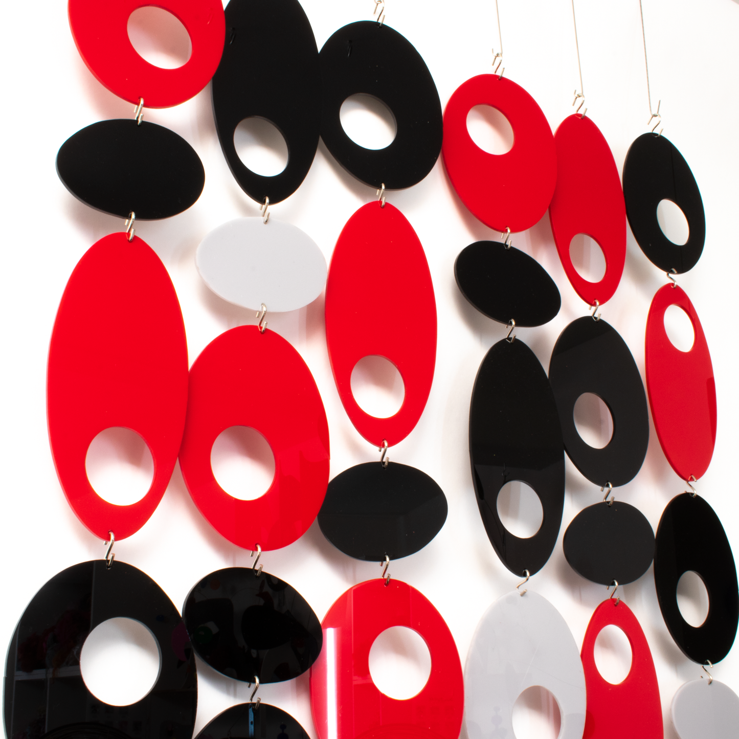 Side view of Dramatic red, black and gray wall art, room divider screen, window treatment, or mobile - DIY Kit by AtomicMobiles.com