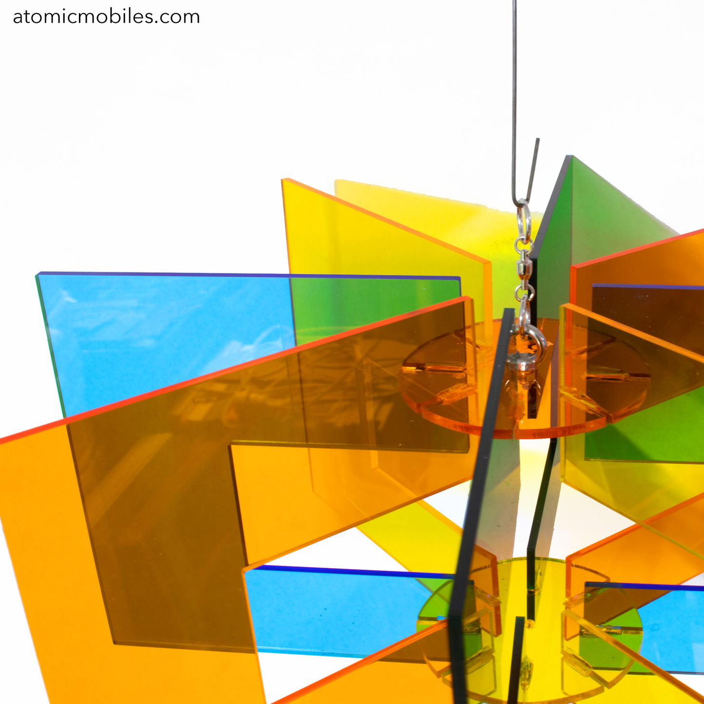 Space Age RotaMobile - beautiful rotating kinetic hanging art mobile in clear acrylic colors of Orange, Yellow, Blue and Green by AtomicMobiles.com