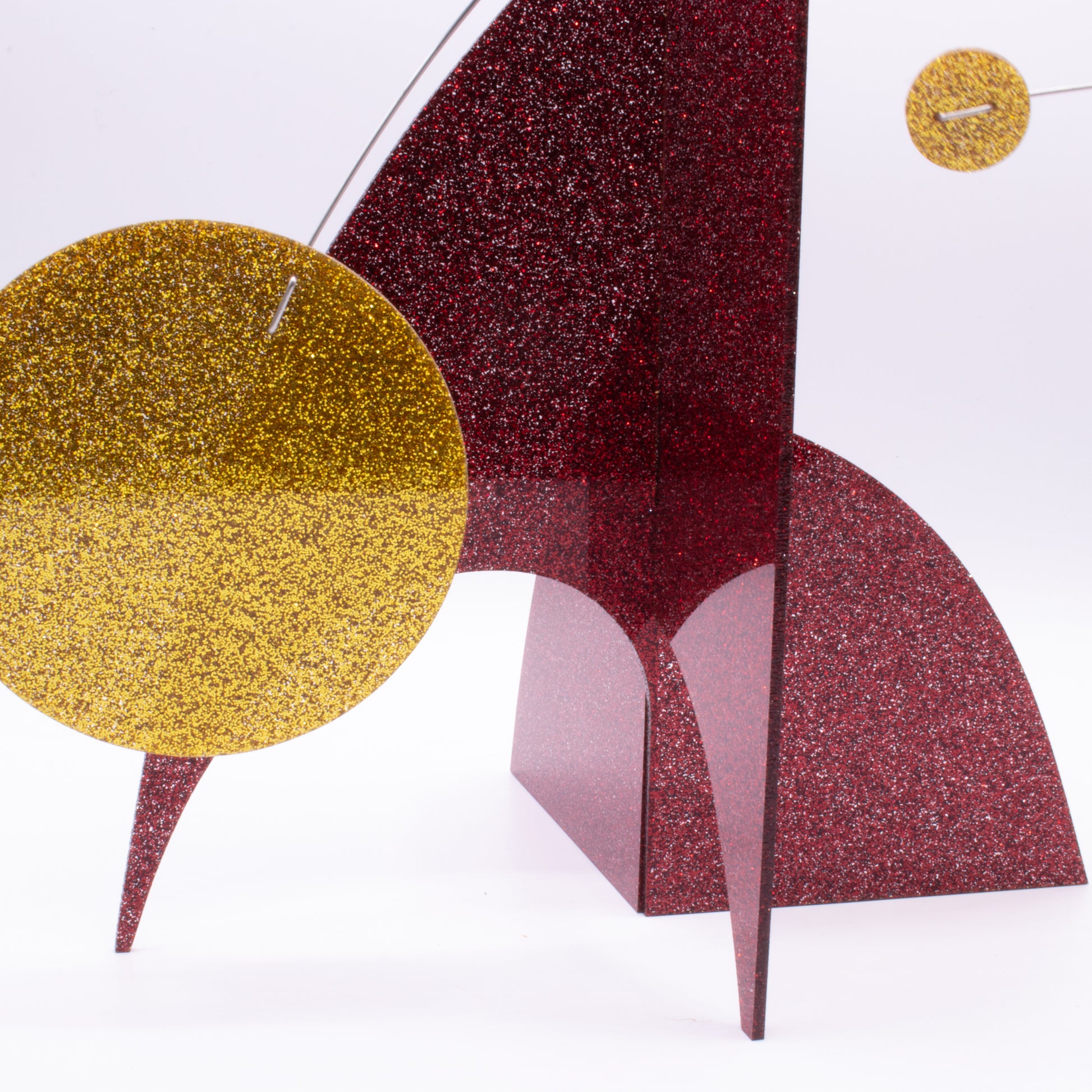 Closeup of Glitter Red and Gold Glitter Christmas Modern Art Stabile Sculpture by AtomicMobiles.com