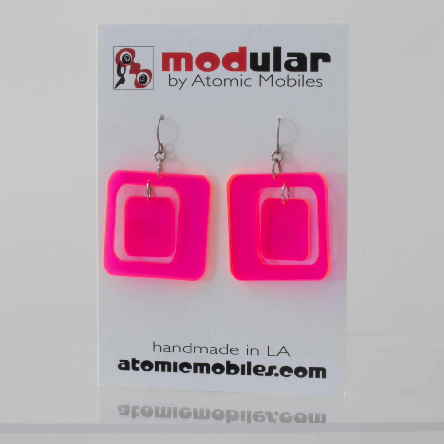 Coolsville 1970s Mid Century Modern Style Earrings in Neon Fluorescent Hot Pink plexiglass acrylic by AtomicMobiles.com