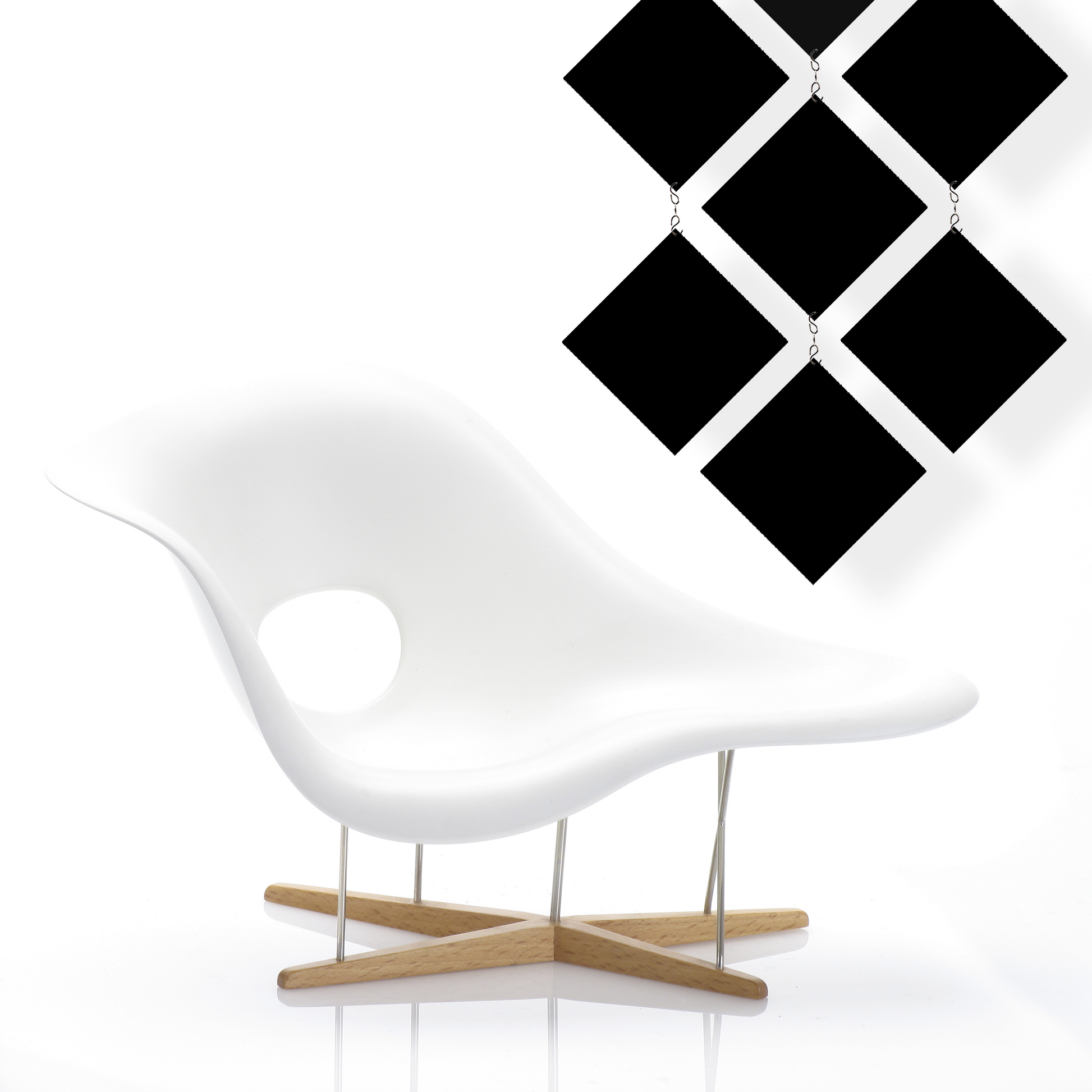 Black MODcast Diamond Pattern Hanging Kinetic Room Divider Panels with white eames chaise lounge - mid century modern kinetic art by AtomicMobiles.com