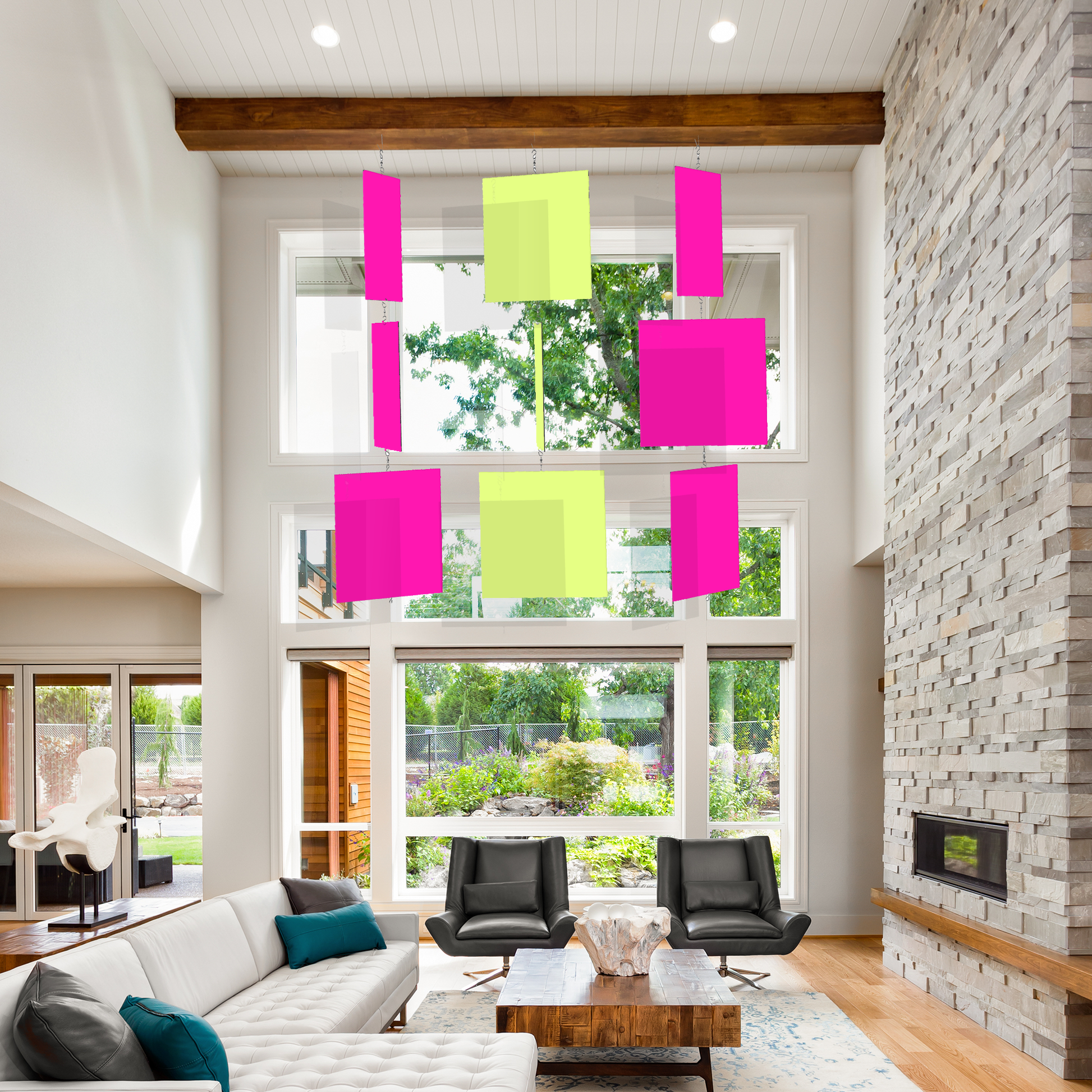 MODcast XXL Huge hanging art mobiles in fluorescent pink and fluorescent green in modern living room with tall ceiling - by AtomicMobiles.com