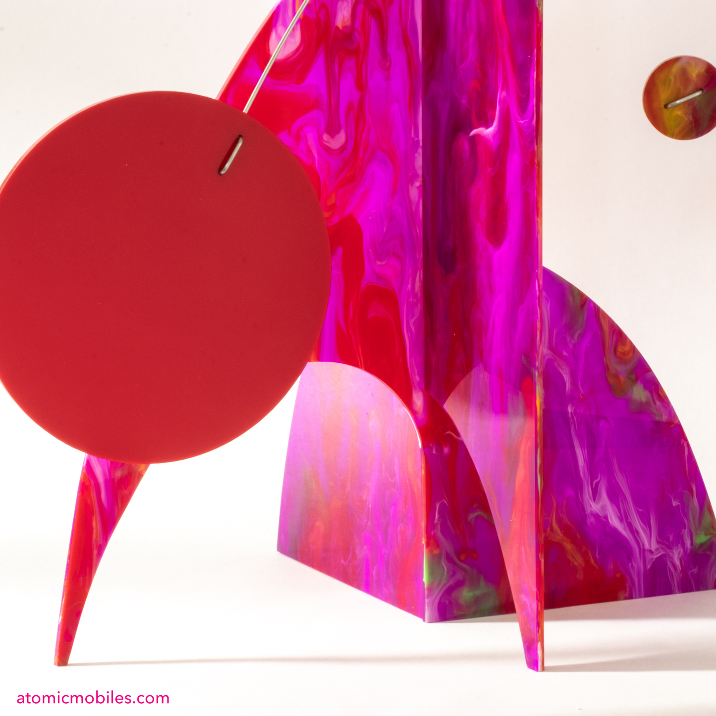 Closeup of Fuchsia Fling Modern Art Stabile - table top kinetic art mobile in hot pink, purple, and red, handmade in Los Angeles by Debra Ann of AtomicMobiles.com
