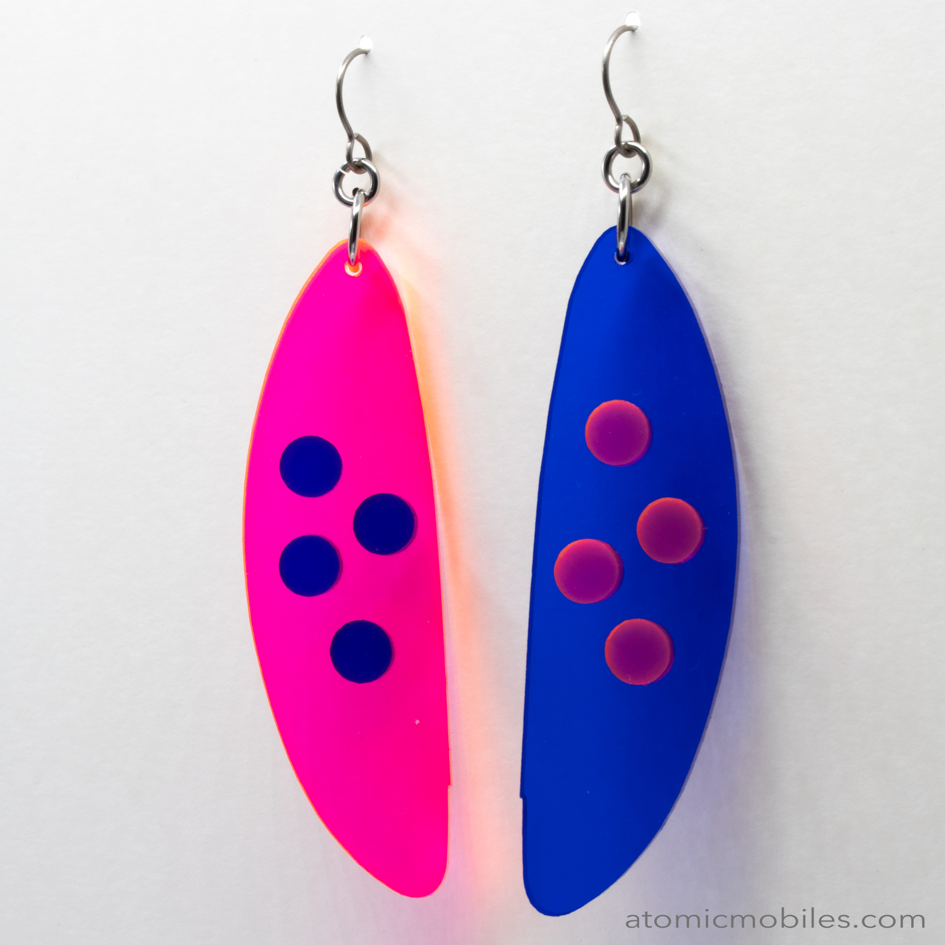 POPdots modern retro statement earrings in Neon Fluorescent Hot Pink and Clear Navy Blue acrylic by AtomicMobiles.com