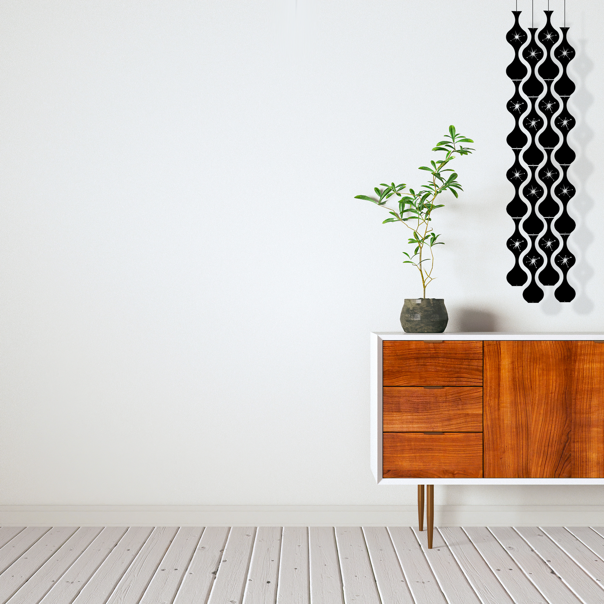 Jeannie Stardust Mid Century Modern black retro hanging art mobile -  DIY Kit next to modern credenza - by AtomicMobiles.com