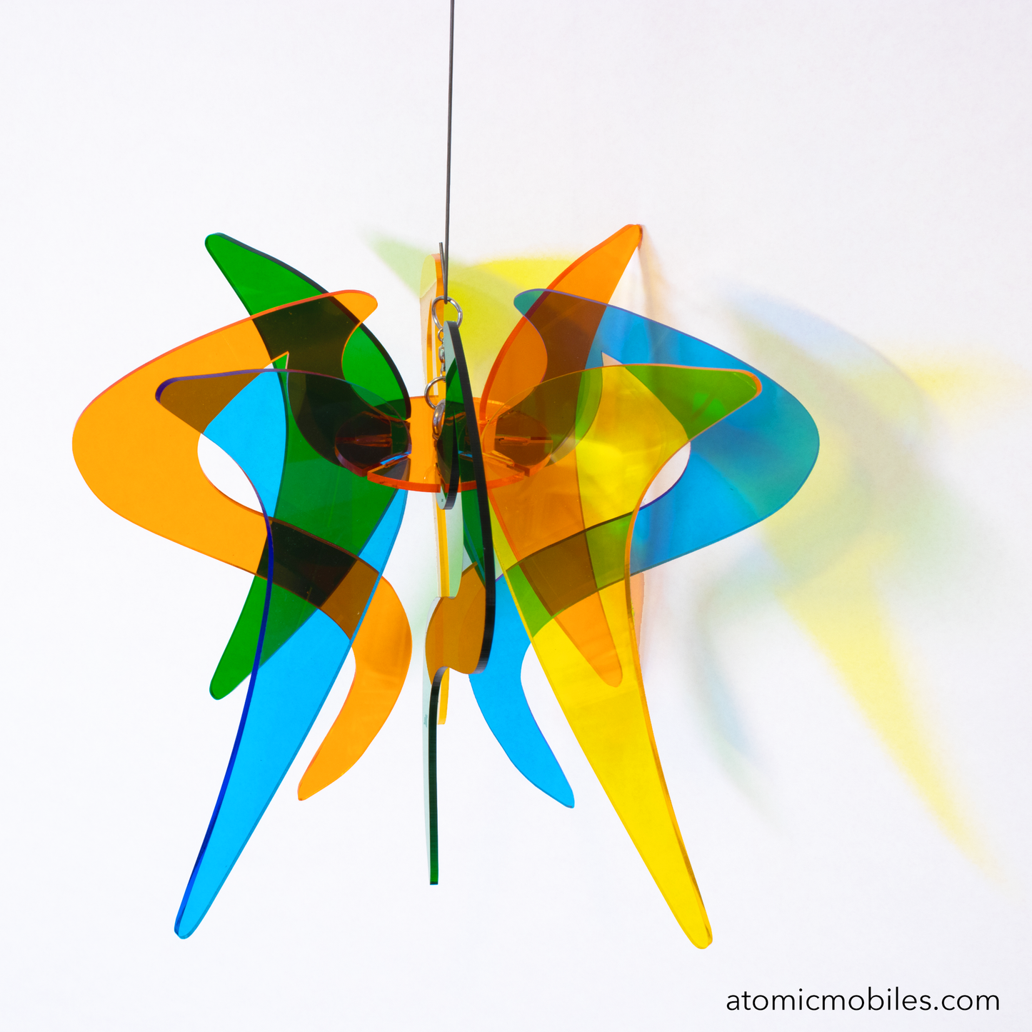 Genie Space Age RotaMobile kinetic hanging art mobile in clear Orange, Yellow, Blue, and Green acrylic plexiglass by AtomicMobiles.com