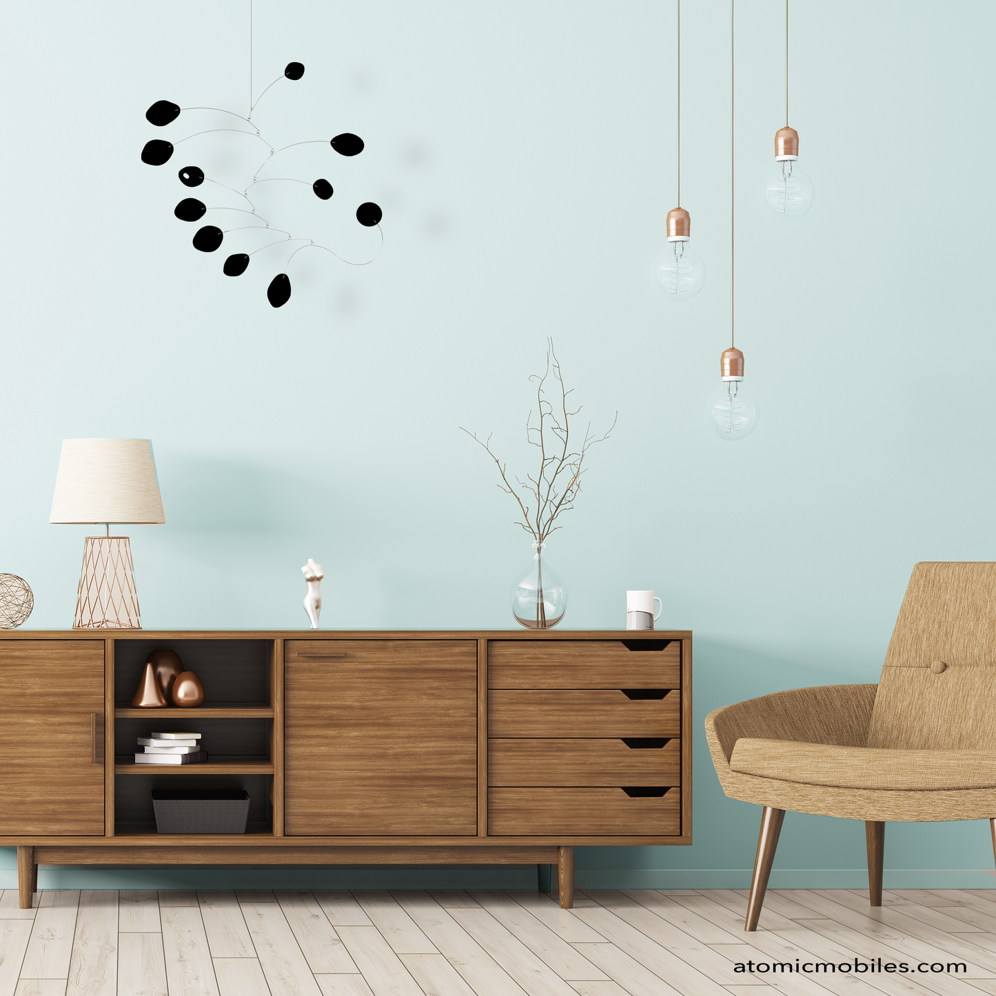 Beautiful mid century modern room with wood credenza sideboard, mcm chair, and all black MCM hanging art mobile by AtomicMobiles.com