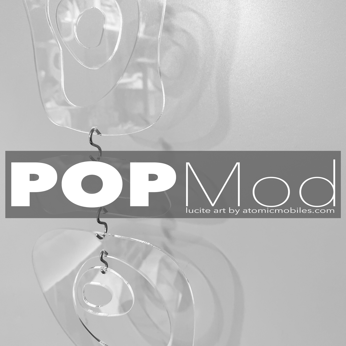 POPMod Retro-A-GoGo clear lucite acrylic plexiglass hanging art mobiles, room dividers and curtains by AtomicMobiles.com
