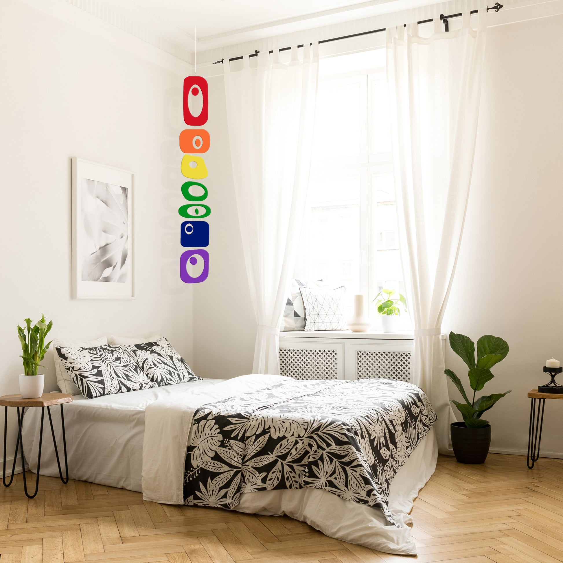 Rainbow Coolsville Vertical Hanging Art Mobile in cozy bedroom with wood floor by AtomicMobiles.com