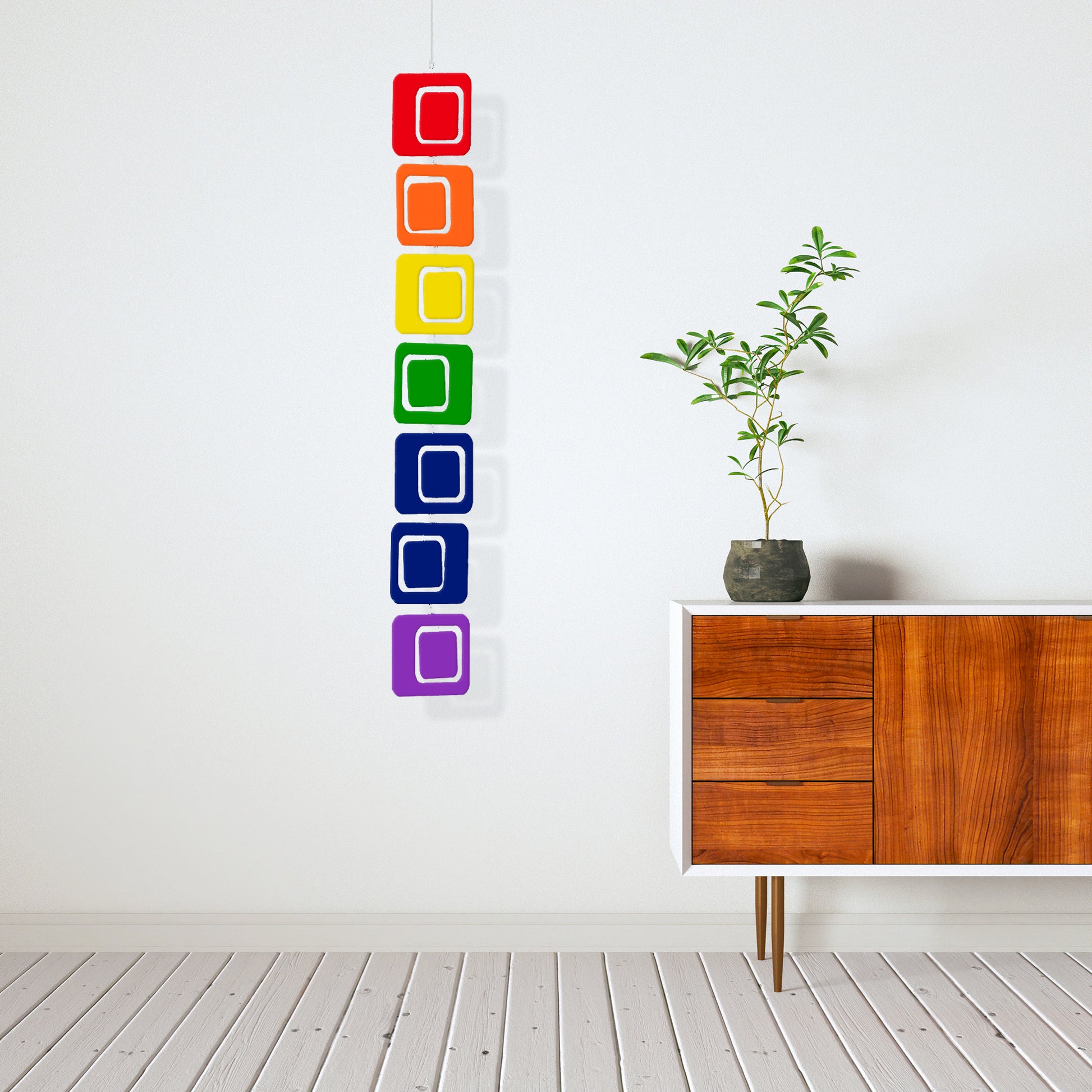 Rainbow Coolsville Vertical Hanging Art Mobile with mid century modern credenza and plant by AtomicMobiles.com