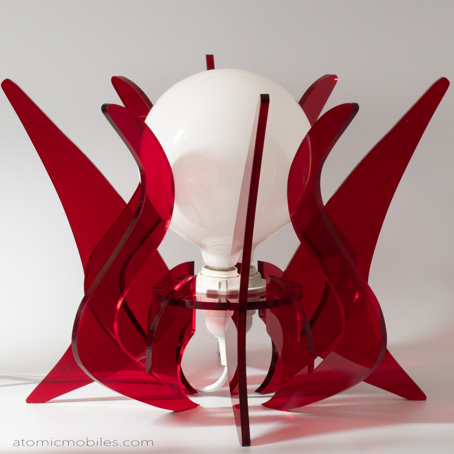 Spectacular retro mid century modern style acrylic plexiglass table top lamp in clear red by AtomicMobiles.com