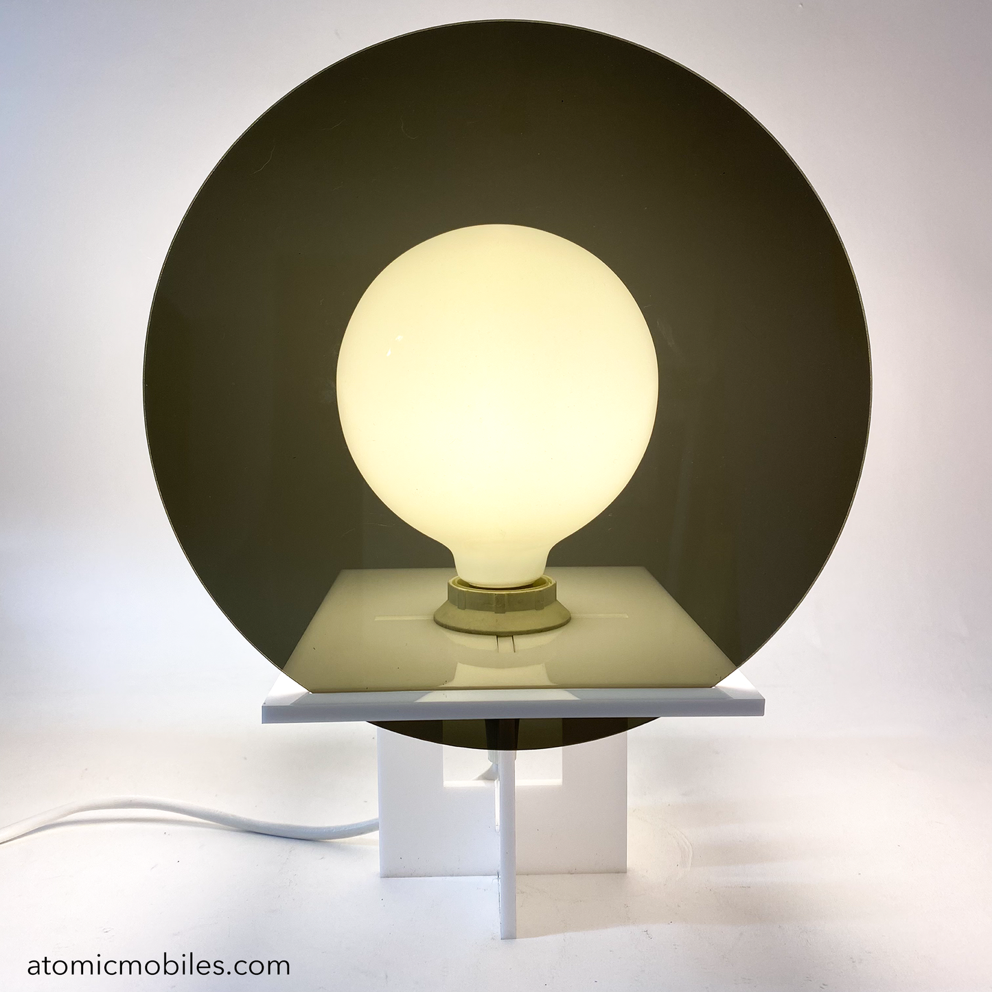 RETROSPECT Space Age Lamp by AtomicMobiles.com with Smoky Gray round lens cover over globe light bulb