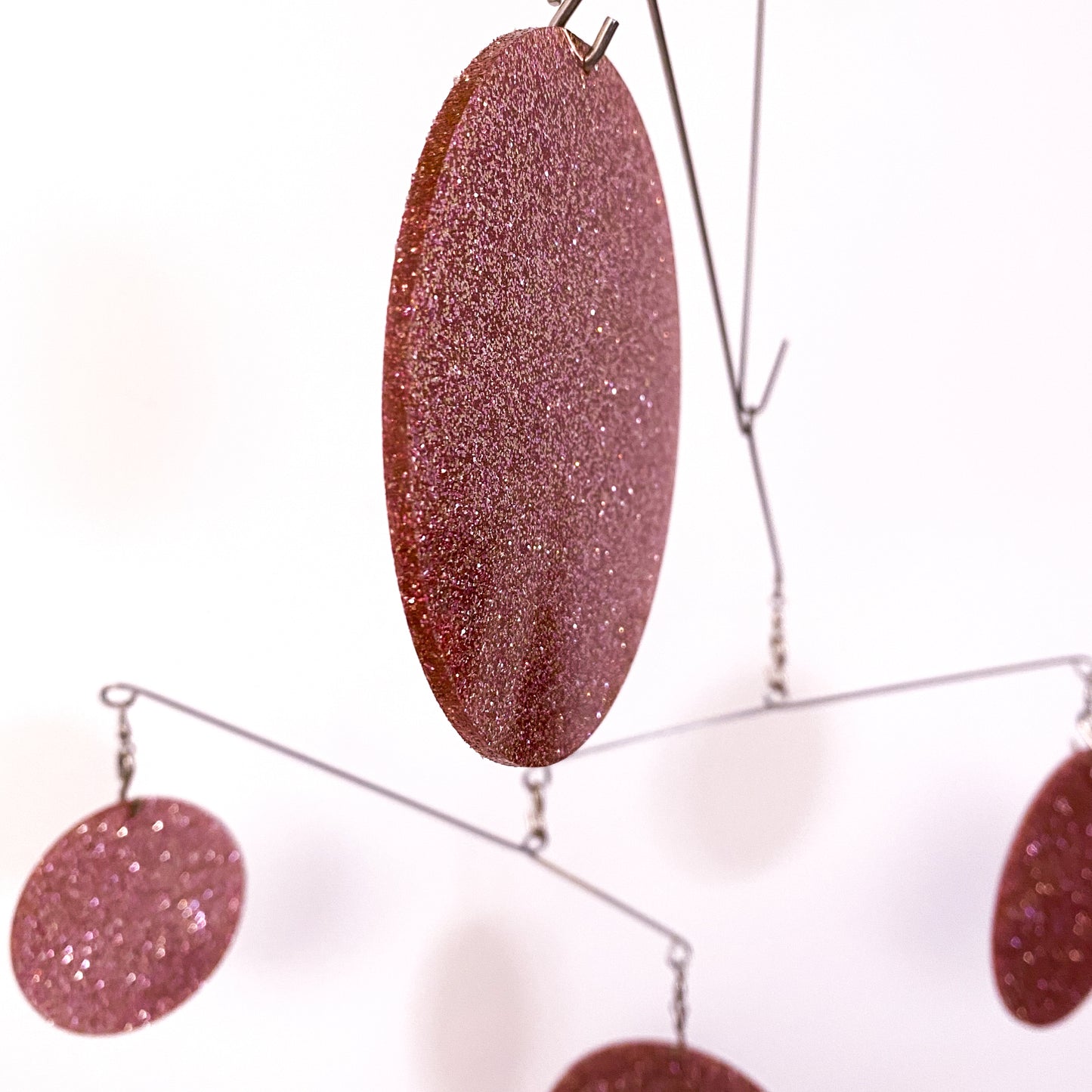 Closeup of  Rose Gold Atomic Mobile DIY Kit - kinetic hanging art by AtomicMobiles.com