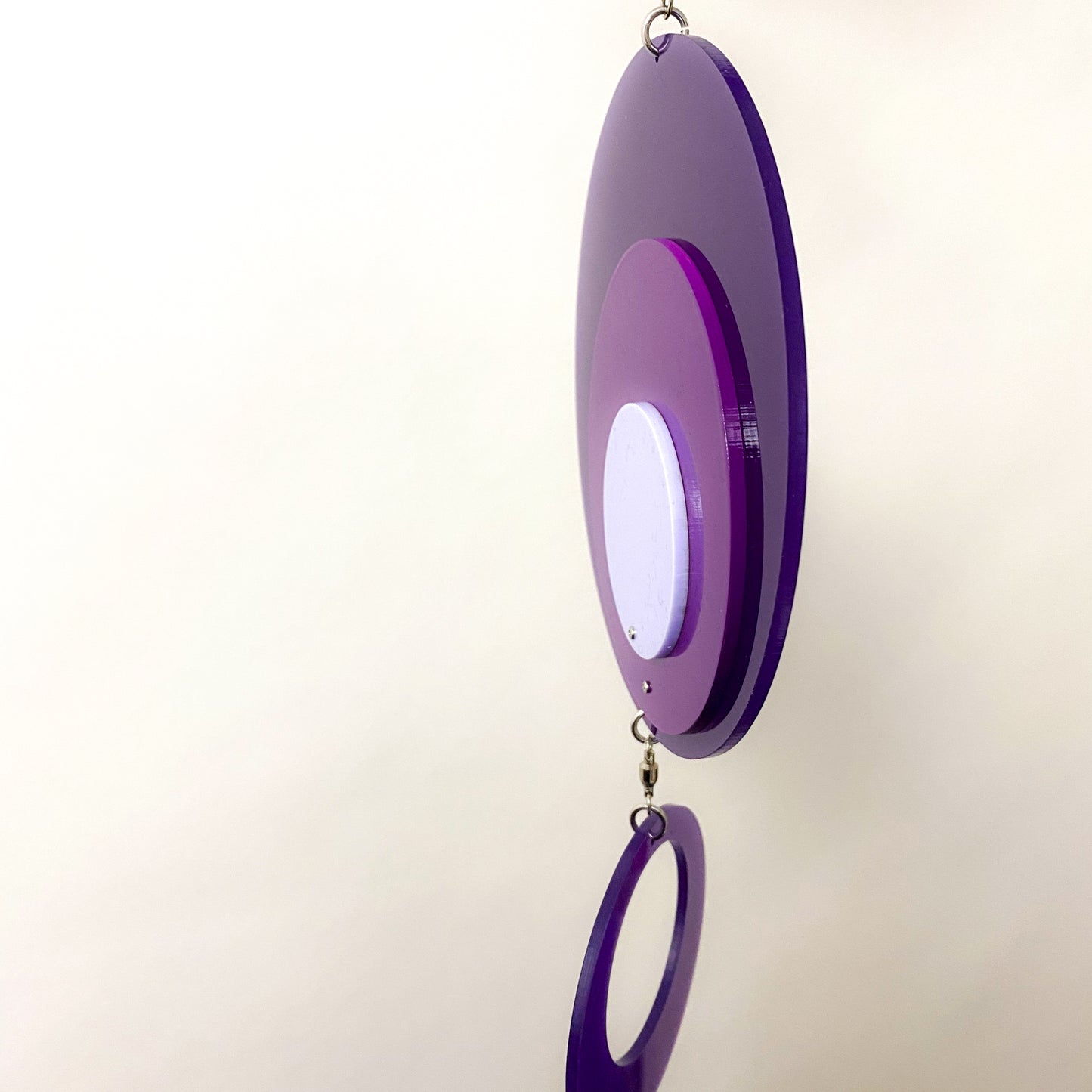 Side view of Retro 1970s vertical kinetic art mobile in purple circle DOTS ready to ship today by AtomicMobiles.com