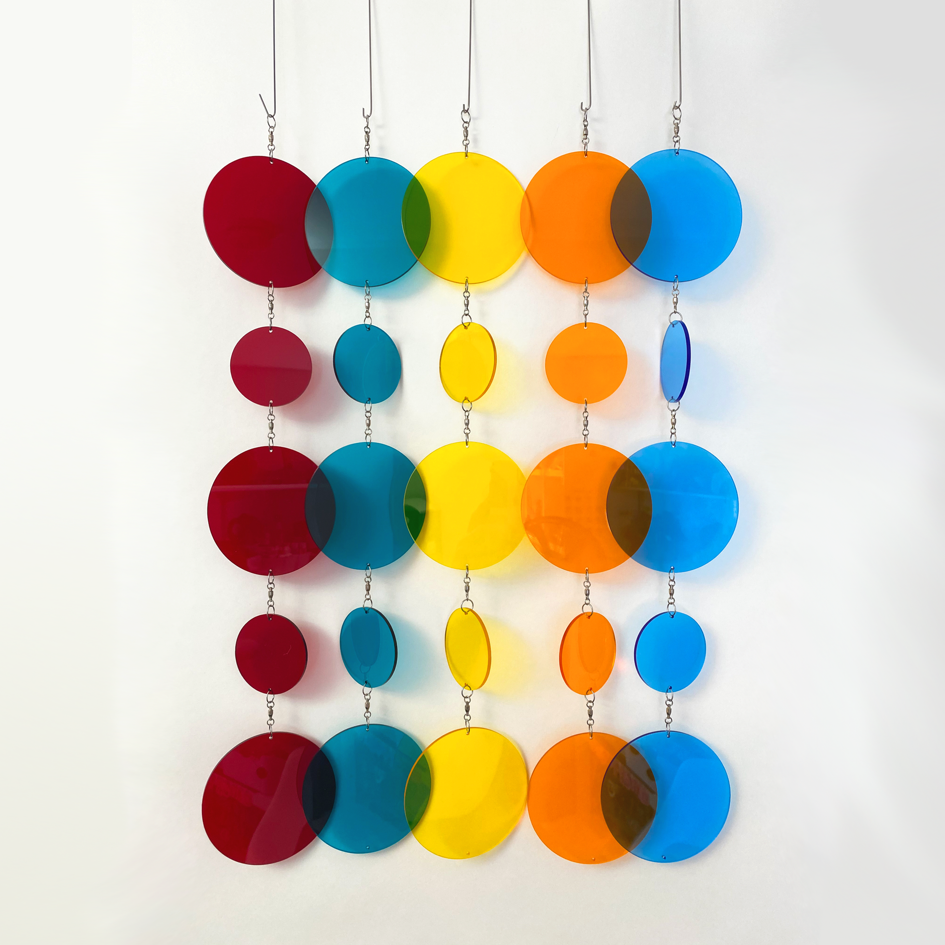 Mod Twirlies - vertical mobiles in bold reflective clear acrylic colors of red, teal, yellow, orange, and blue - by AtomicMobiles.com