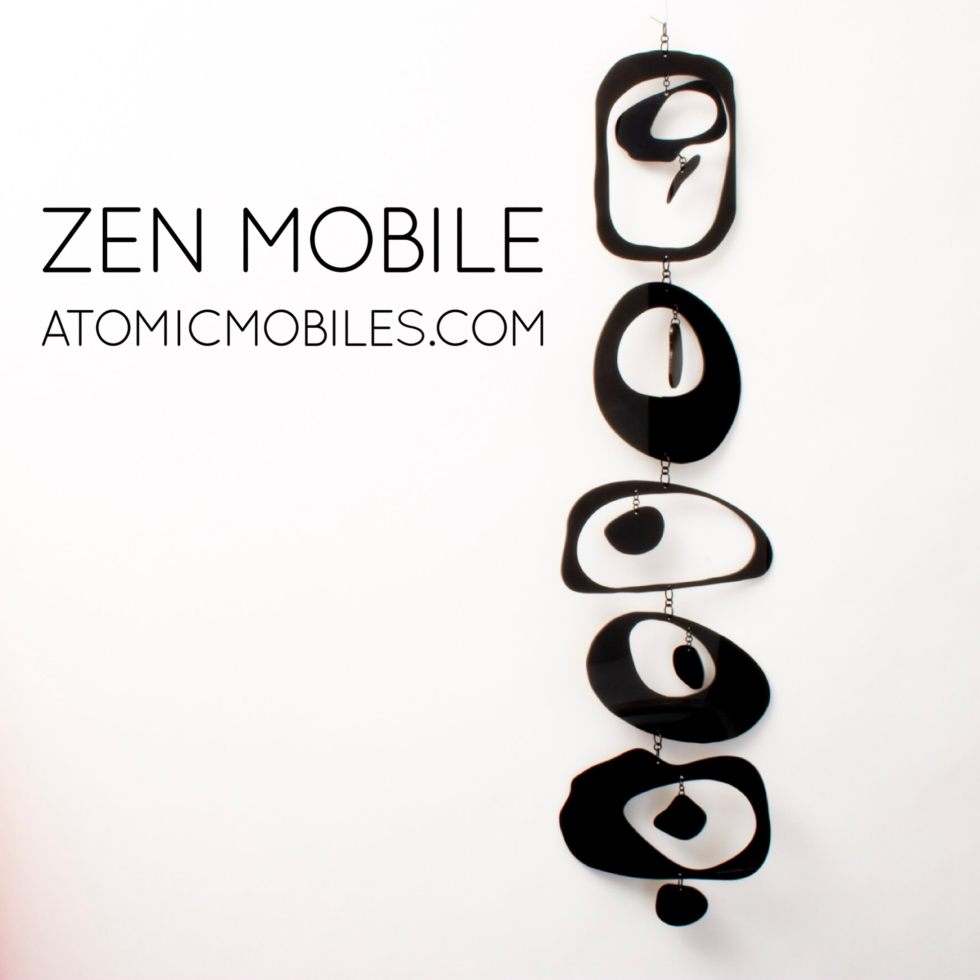 Zen Mobile in Black by AtomicMobiles.com on white background - calm kinetic sculpture inspired by rock balancing