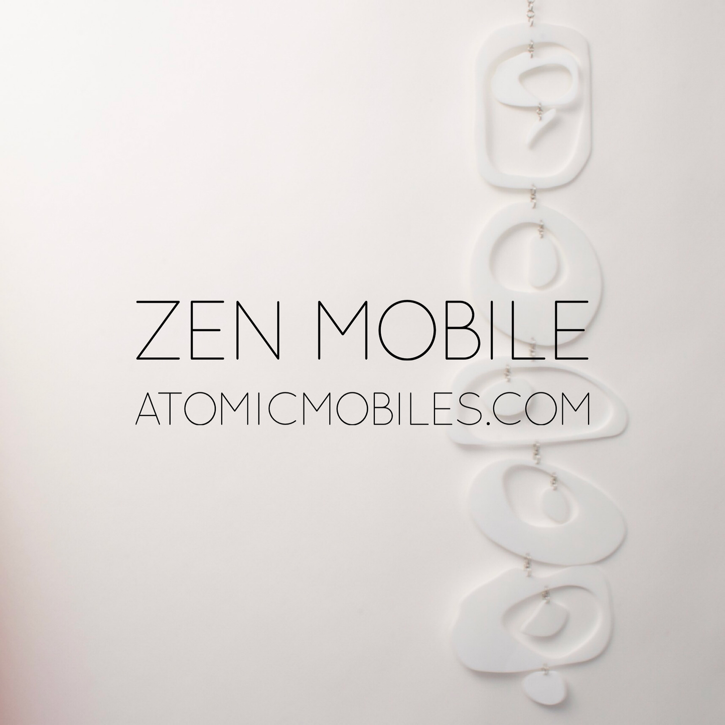 Zen Mobile in White by AtomicMobiles.com on white background - calm kinetic sculpture inspired by rock balancing